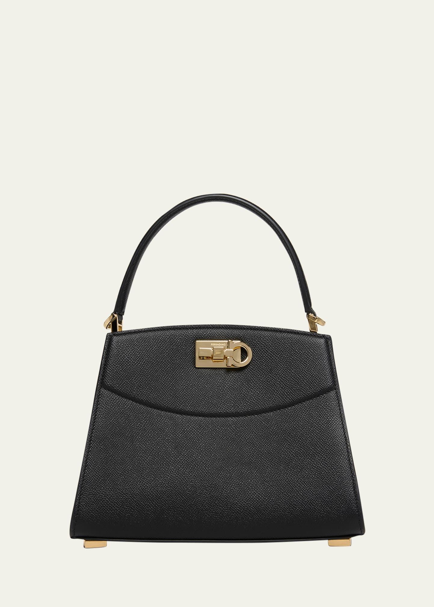 the new studio small box leather top-handle bag