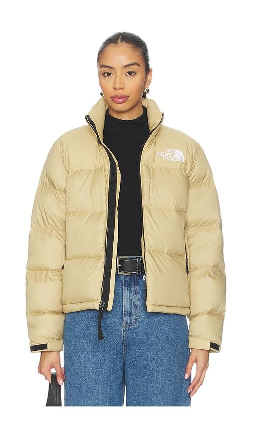 the north face 1996 retro nuptse jacket in tan.