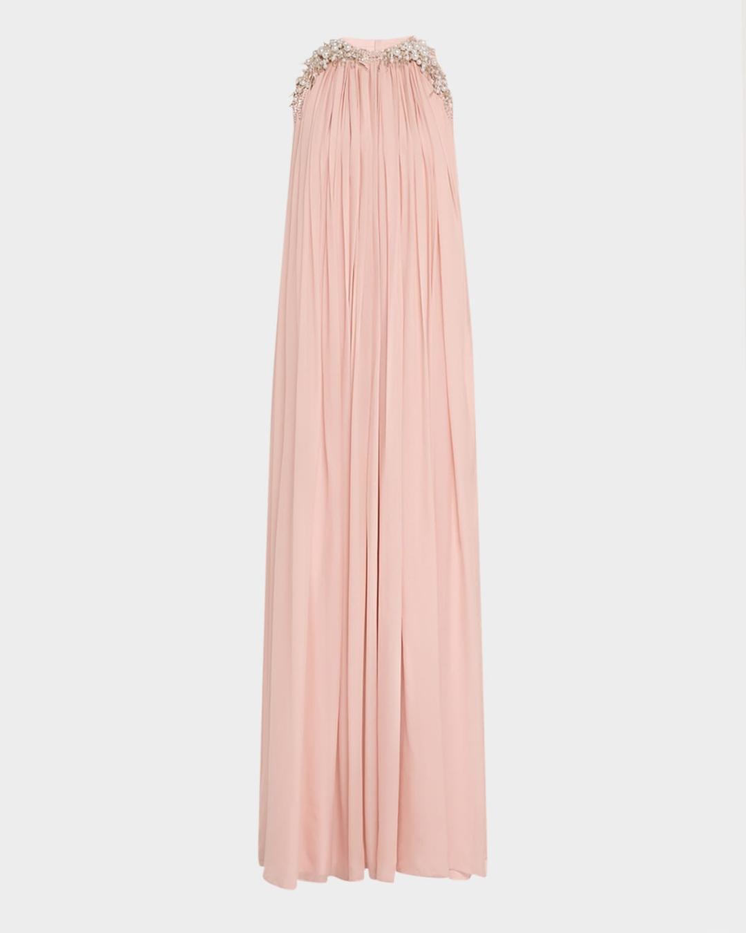 The Pearl Waterfall Embellished Silk Gown – A pleated silk gown with pearl-embellished neckline.