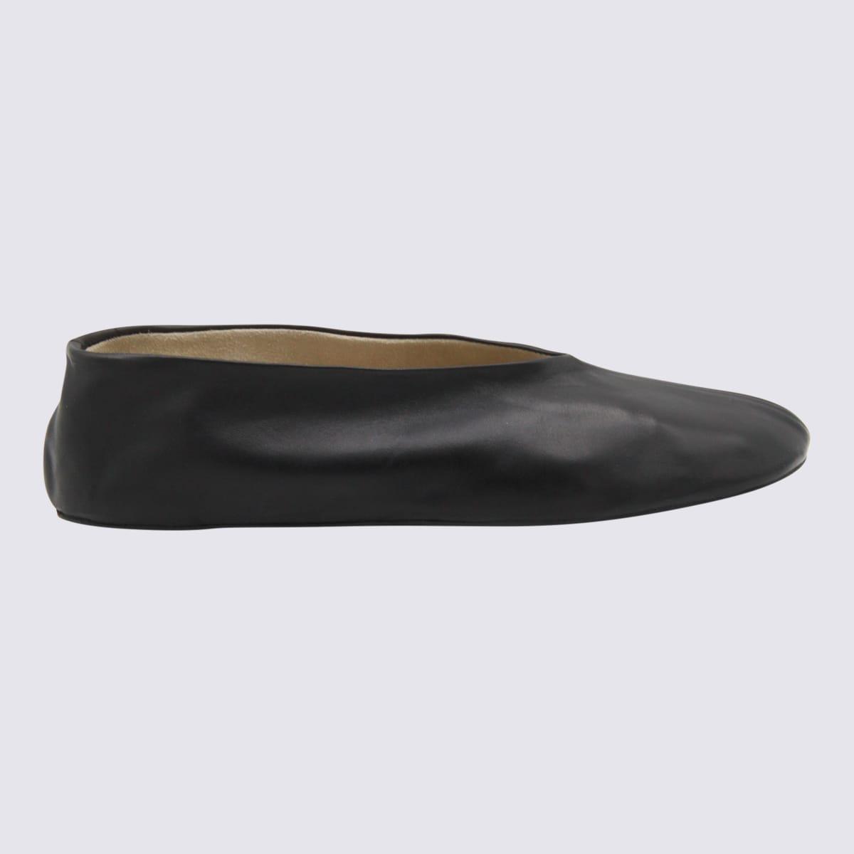 the row black leather flats