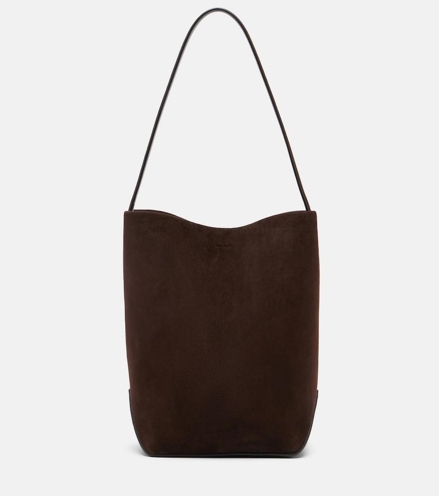 the row n/s park edge medium suede tote bag