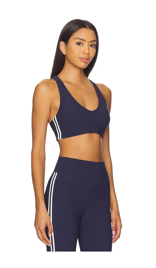 the upside daytona jetta racerback sports bra in navy.