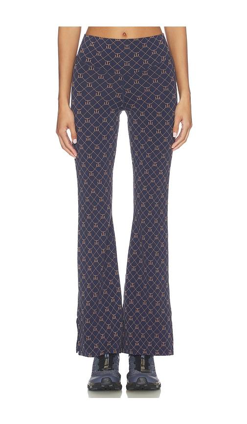 the upside ezra florence flare pant in navy.