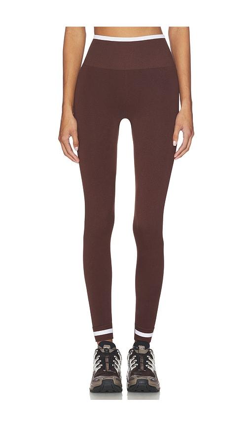 the upside form seamless 25in midi leggings in brown.