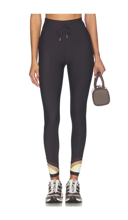 the upside kefi 25in midi pant in brown.