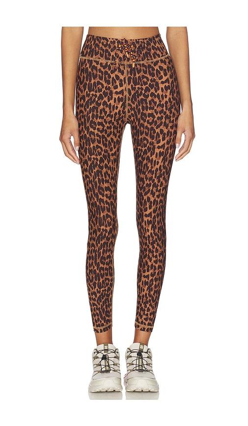 the upside malawi 25in midi leggings in brown.