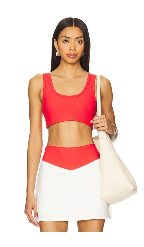the upside pacific harley scoop neck sports bra in red.