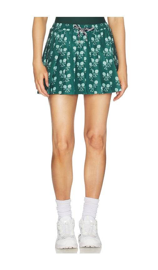 the upside racquet cadiz pleated skirt in green.