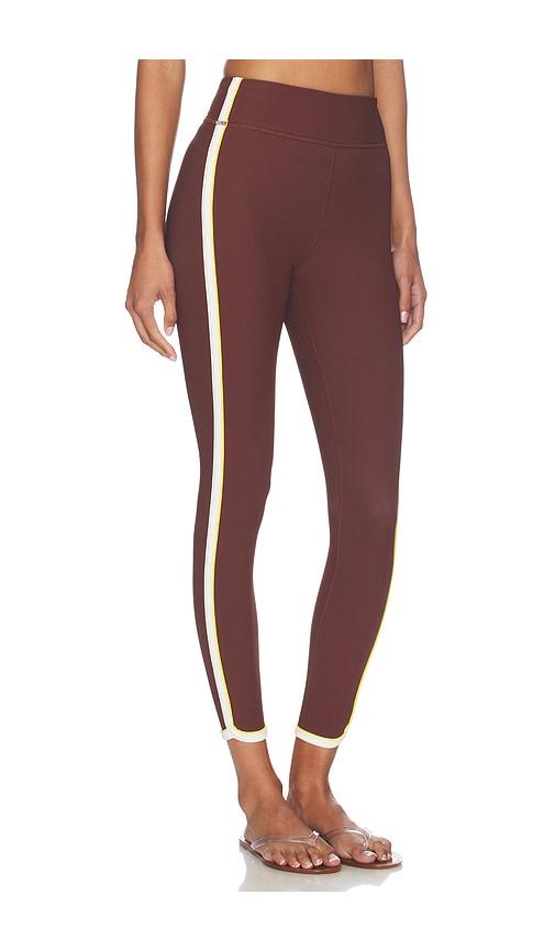 the upside rhythm 25in midi pant in brown.