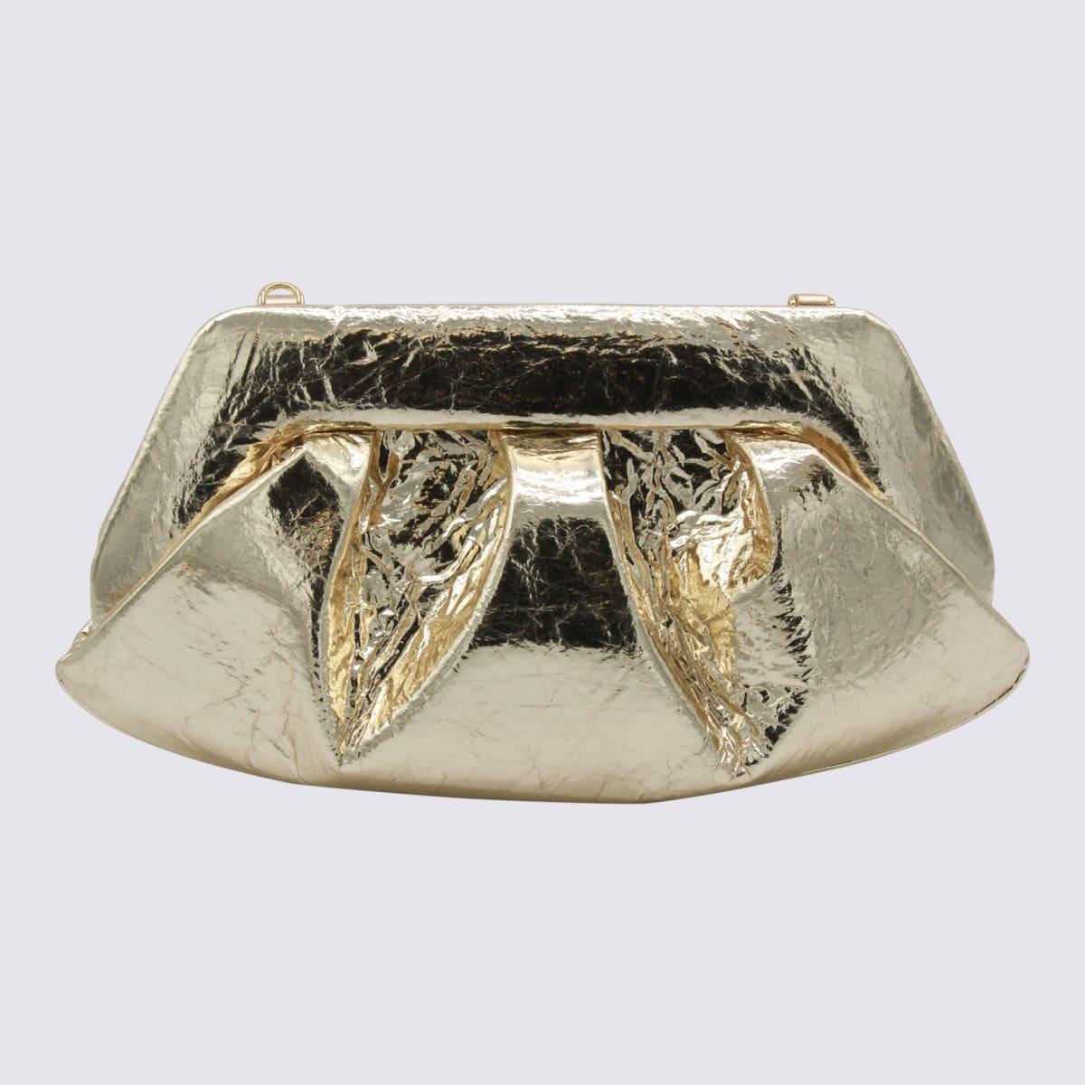 themoirè gold leather emera clutch