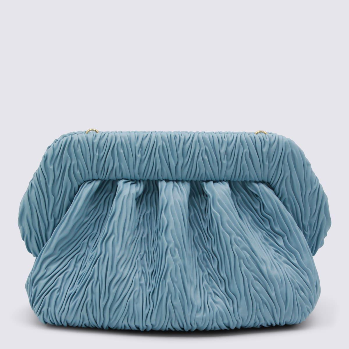 themoirè light blue bios clutches