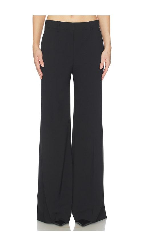 theory fluid flare pants in black.