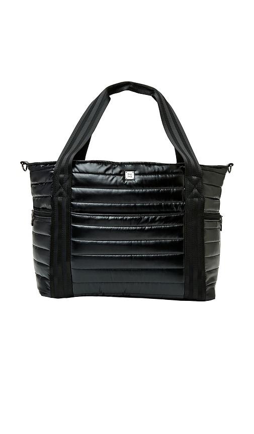 think royln jetset wingman bag in black.