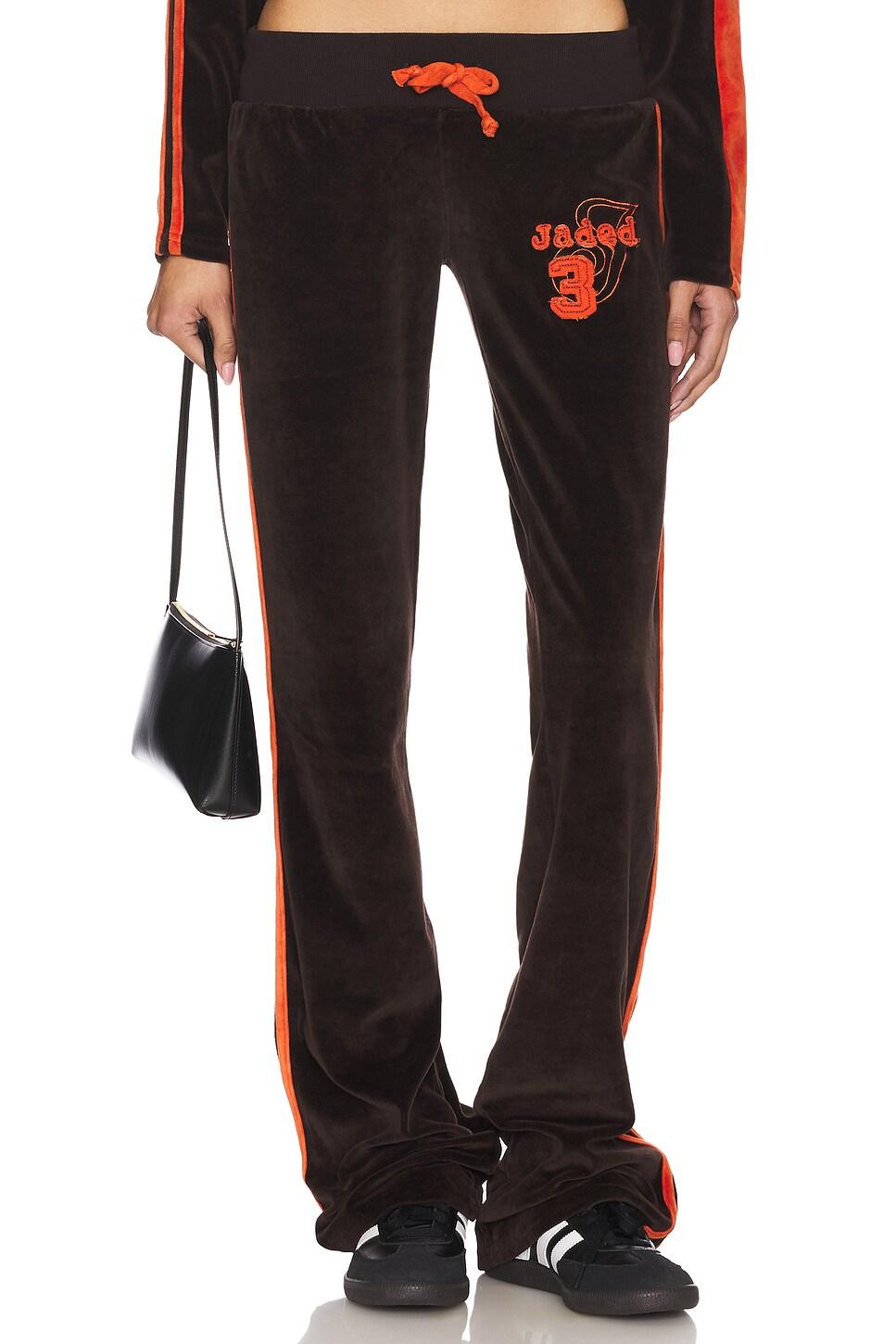 three velour trousers