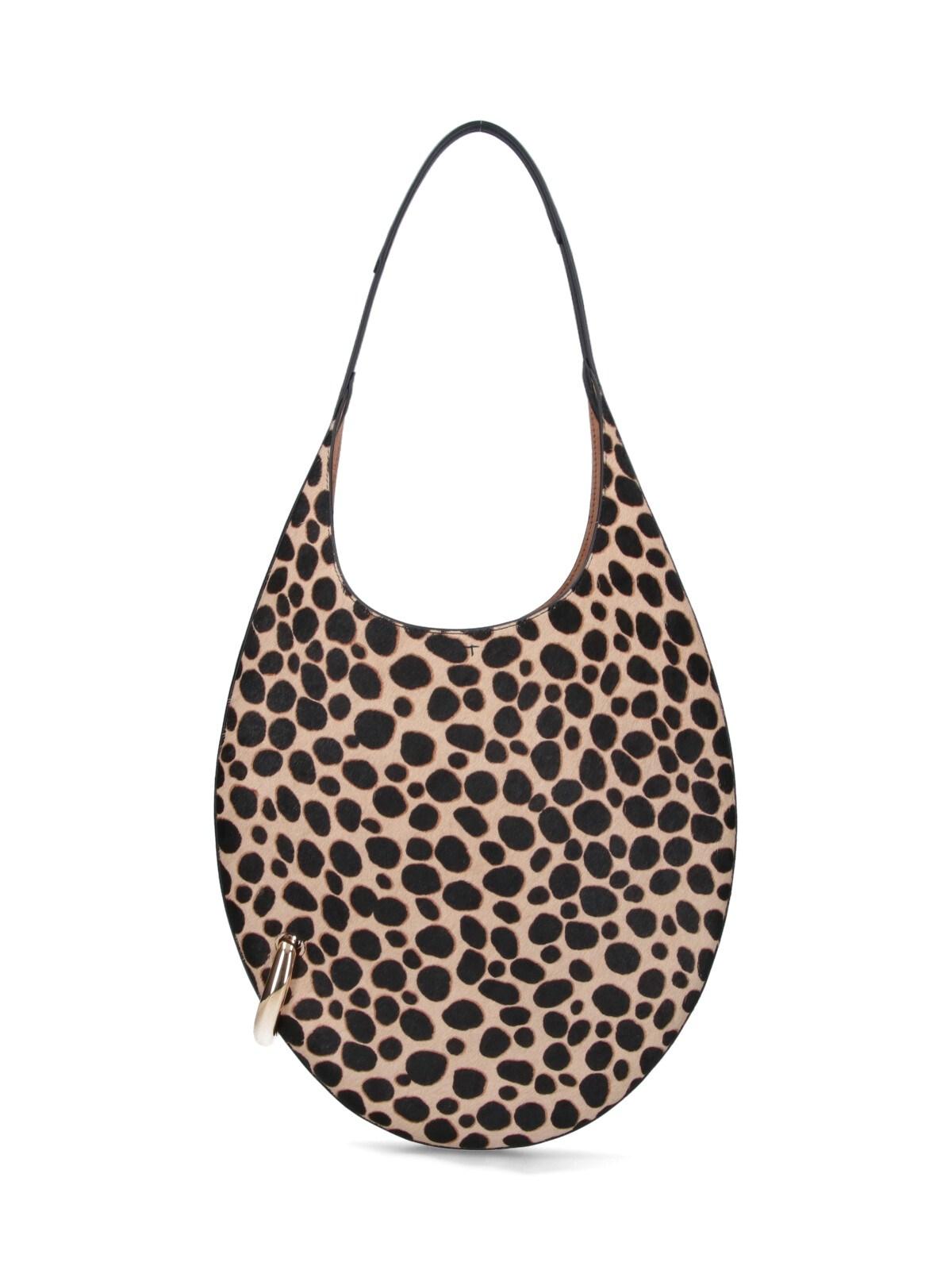 tory burch animal print hobo bag "pierced "