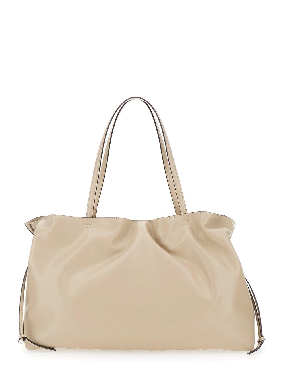 tory burch ella beige shoulder bag with drawstring closure and embossed logo in ecoleather woman