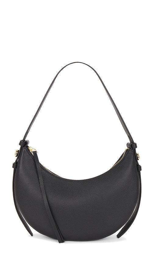 tory burch romy half moon bag in black.