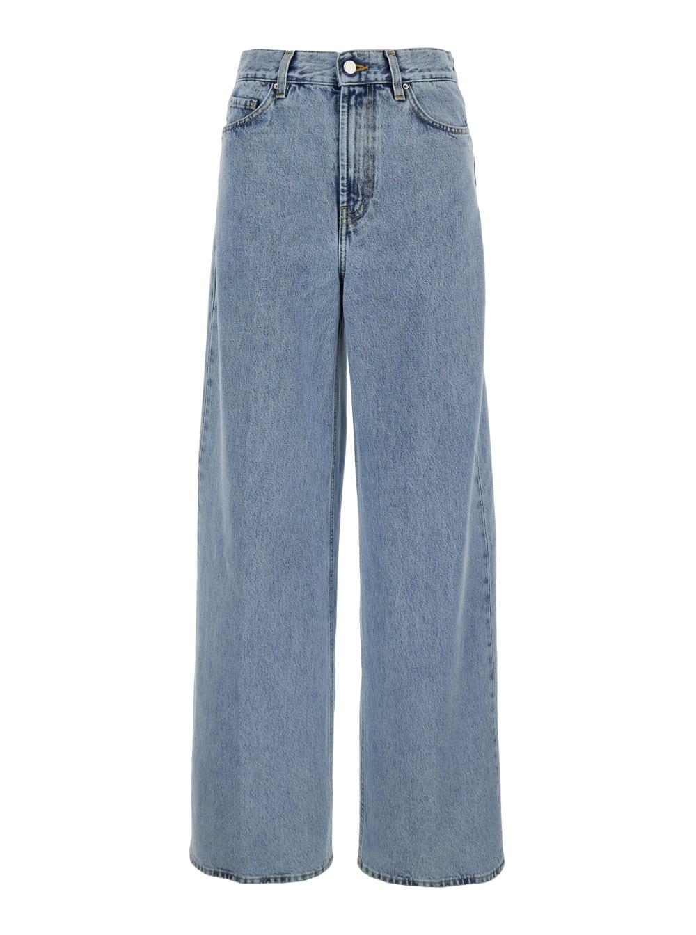 totême light blue wide jeans with logo patch in denim woman