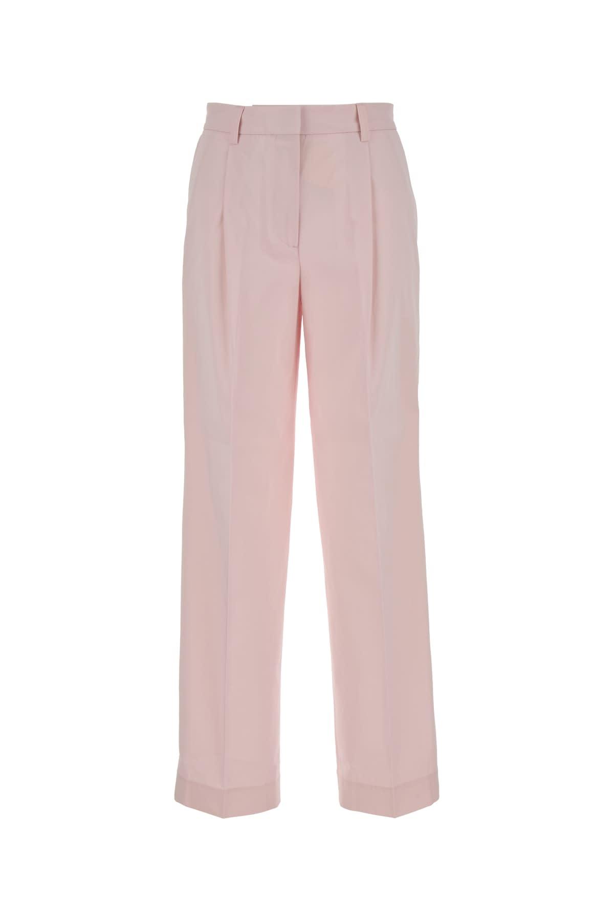totême slanted pocket trousers