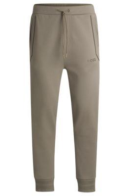 tracksuit bottoms with mirror-effect logo- light green men's jogging pants