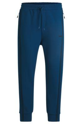 tracksuit bottoms with tape inserts- light blue men's jogging pants