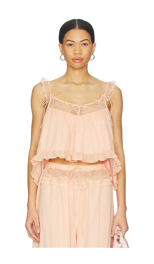 tularosa lumi top in peach.
