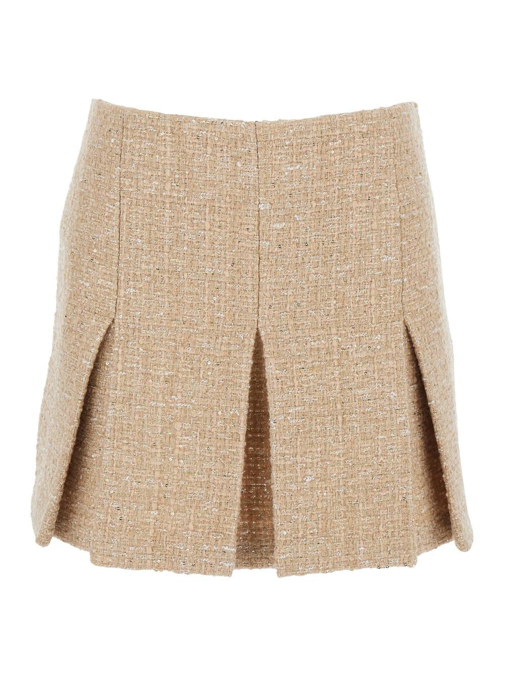 twinset beige miniskirt with pleated details on the front and logo plaque on the rear in tech fabric woman