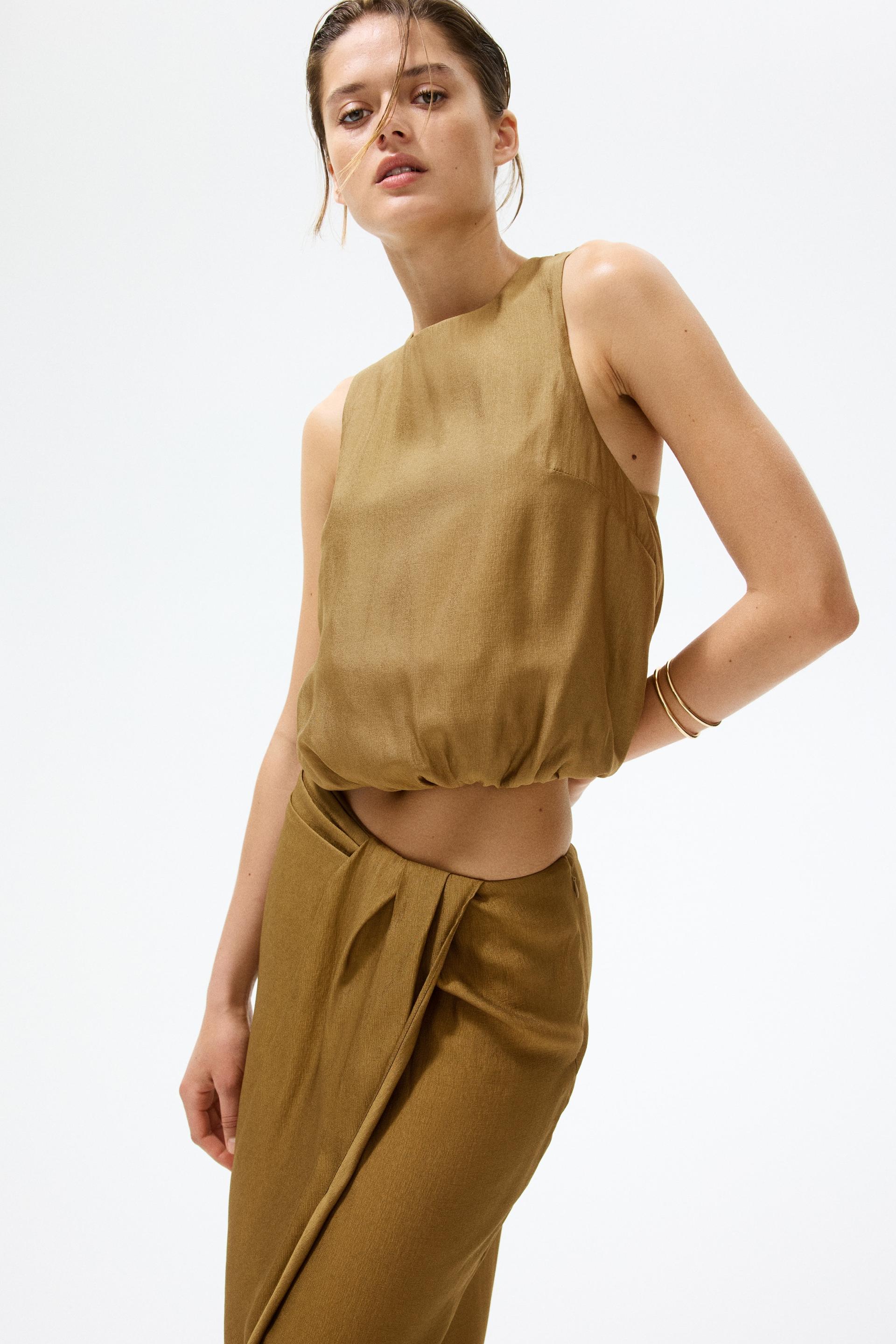 twist-detail bubble-hem top