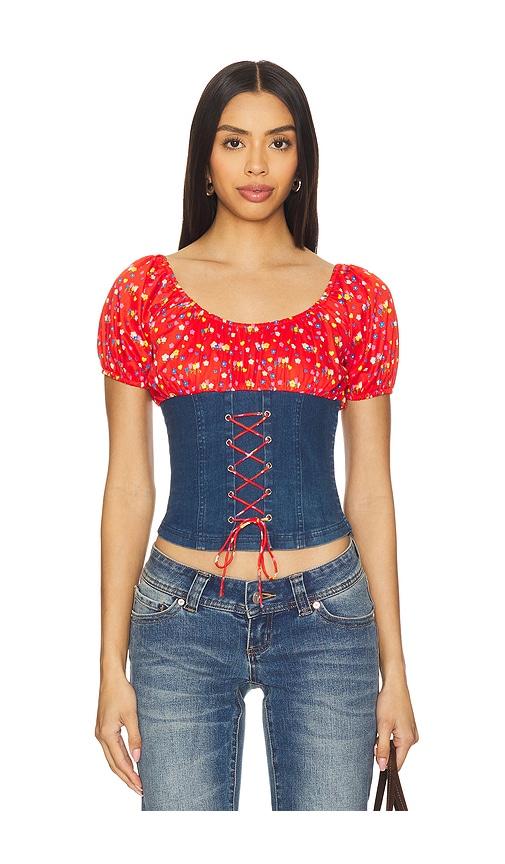 tyler mcgillivary uma top in red,blue.