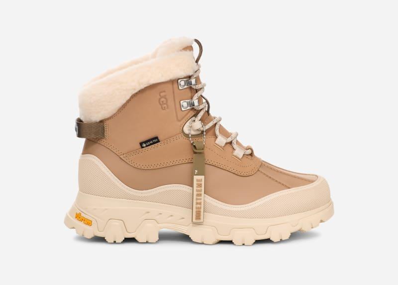 ugg® women's adirondack meridian hiker leather/nubuck boots in sand,