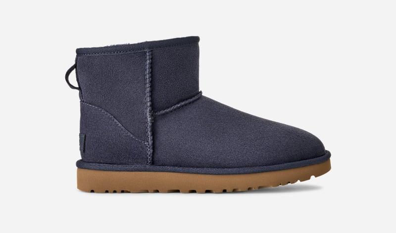ugg® women's classic mini ii sheepskin classic boots in dark indigo,