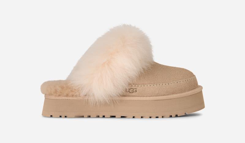 ugg® women's disquette chalet sheepskin slippers in sandcastle,