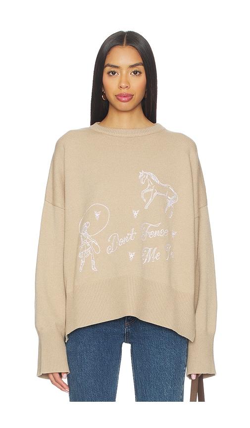 understated leather don't fence me in sweater in beige.