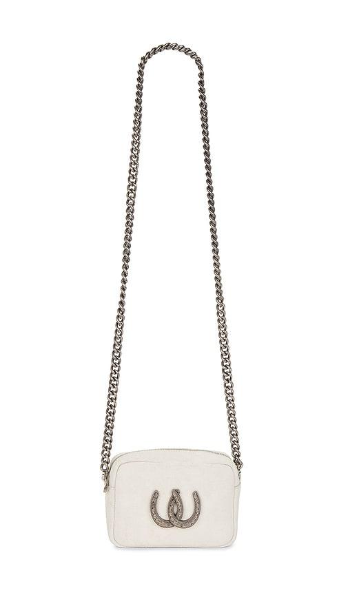 understated leather lady luck camera bag in white.