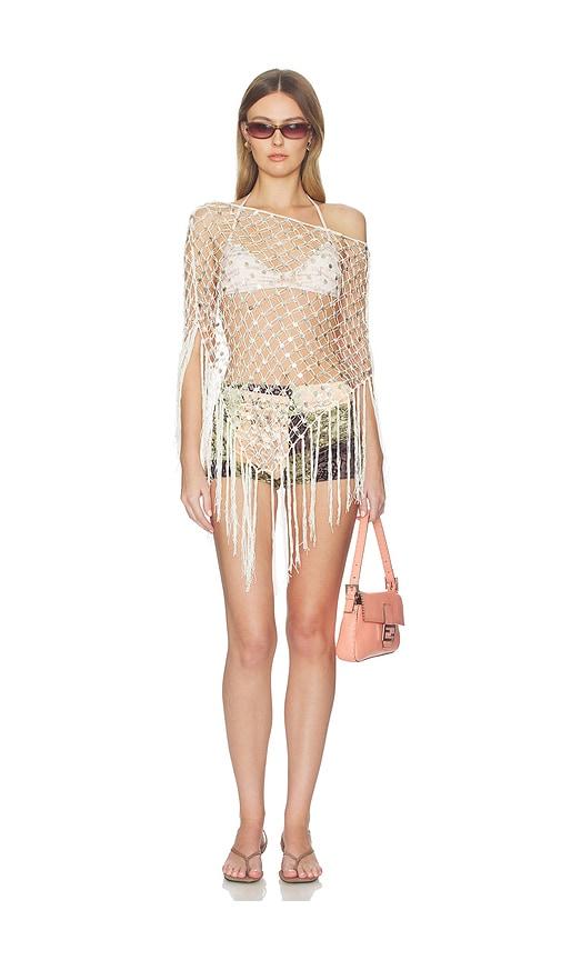 understated leather mountain strings poncho in white.