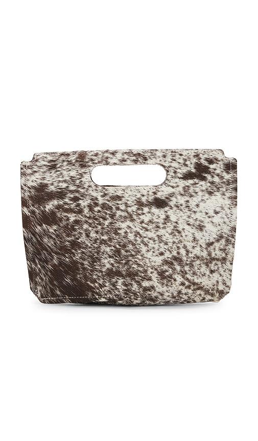understated leather x revolve liar clutch in brown.
