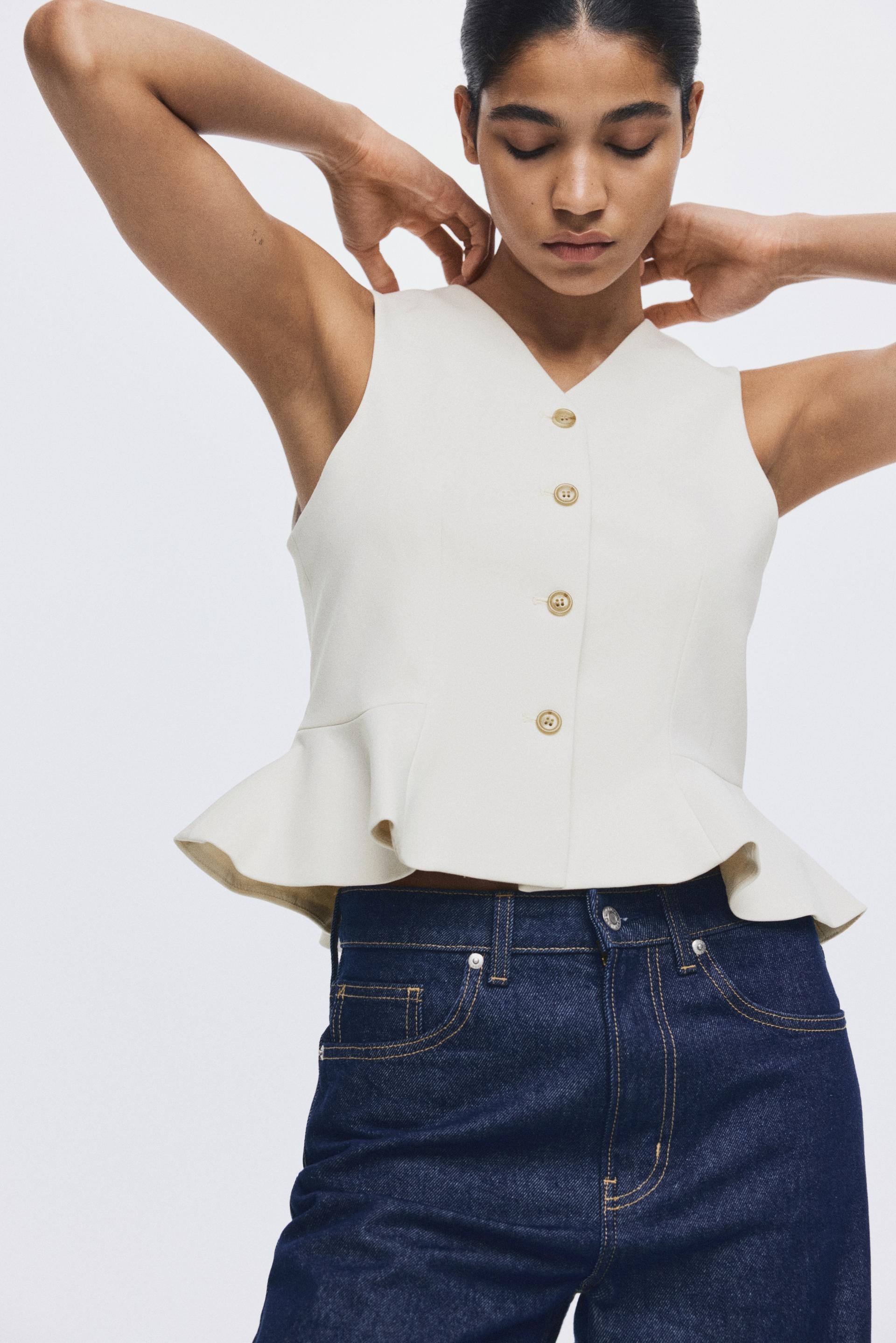 v-neck vest with peplum