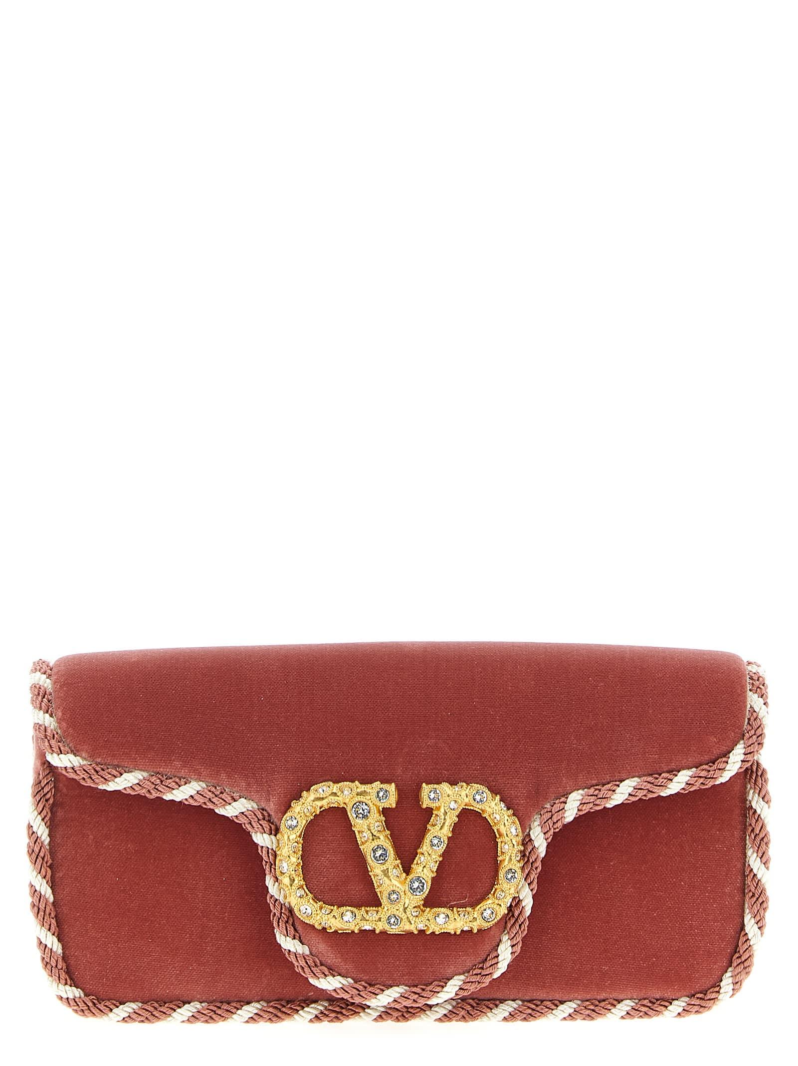valentino garavani locò clutch bag