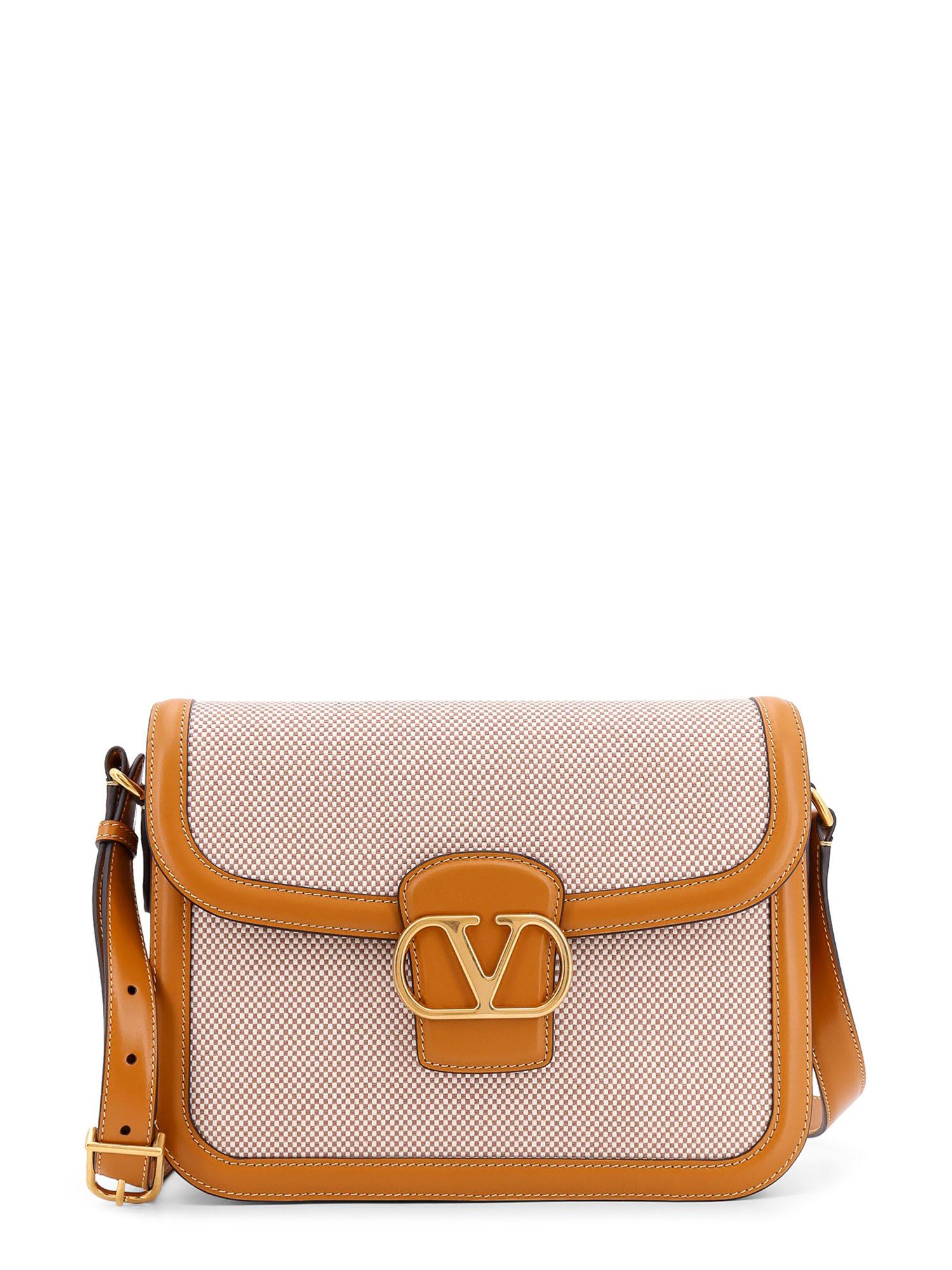 valentino garavani logo plaque foldover top shoulder bag