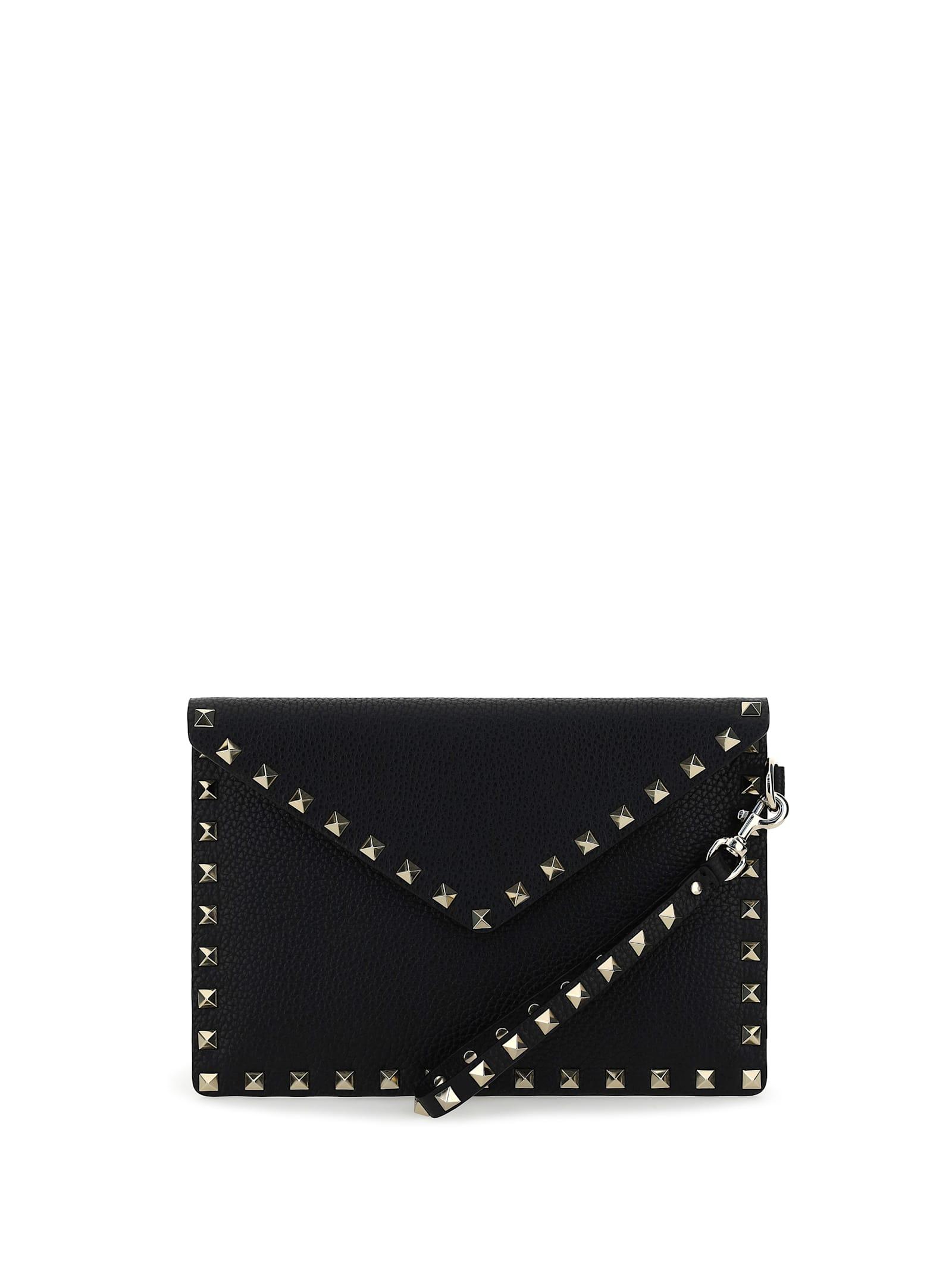 valentino garavani rockstud leather clutch