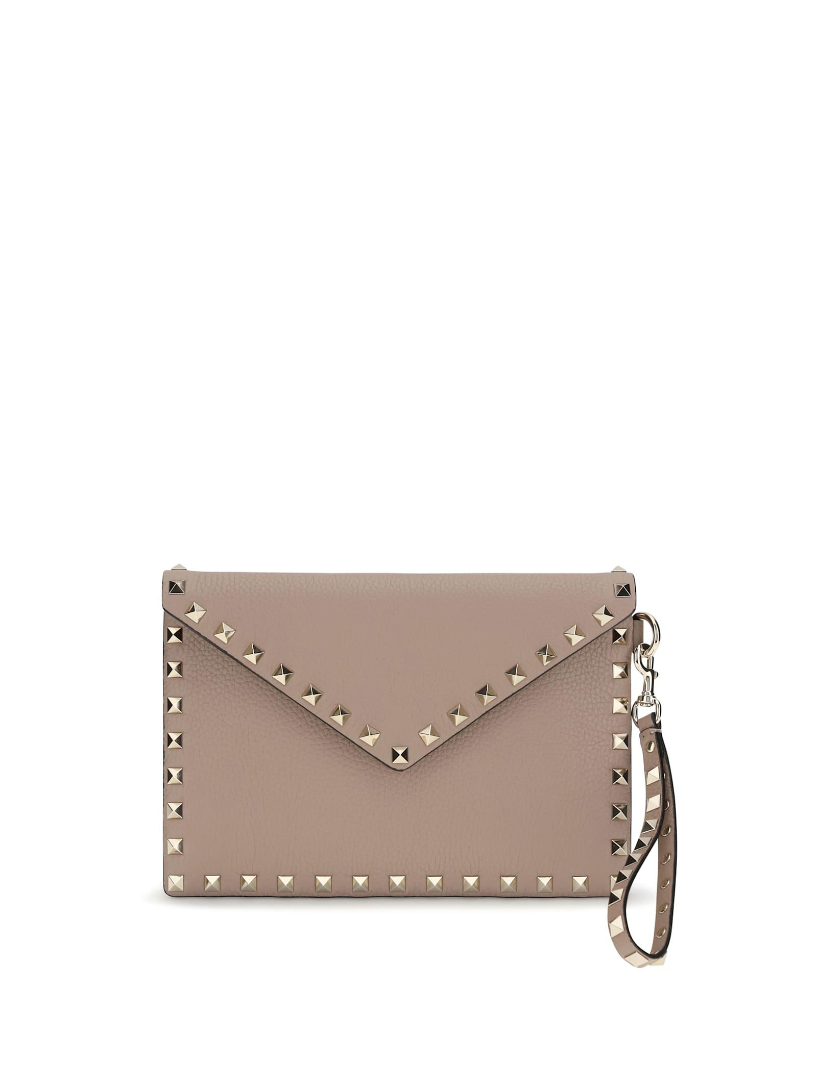 valentino garavani rockstud leather clutch