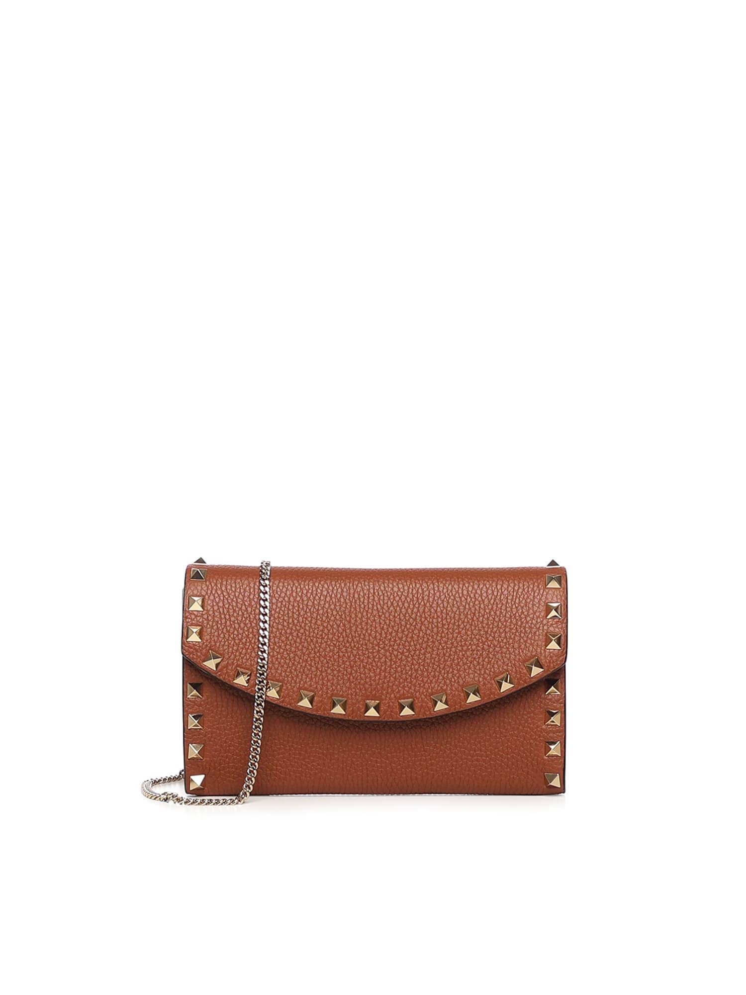 valentino garavani rockstud leather wallet with chain