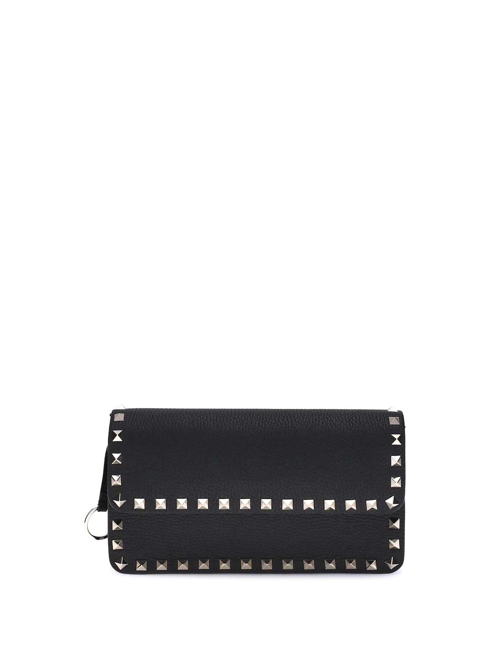 valentino garavani rockstud pochette with chain