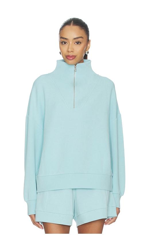 varley hawley half zip sweater in baby blue.