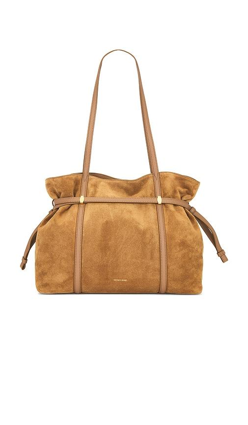 veronica beard suede lasso bag in brown.