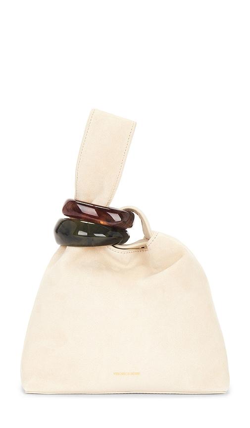 veronica beard suede swing bag in beige.