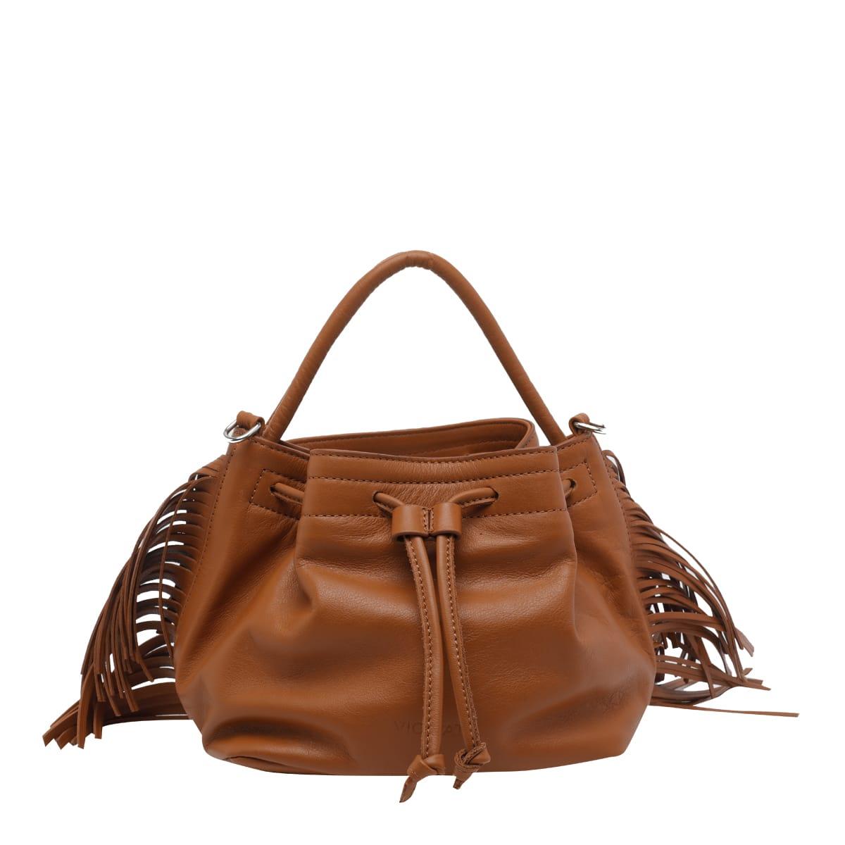 vic matié travel handbag