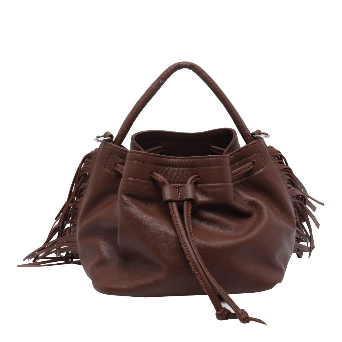 vic matié travel handbag