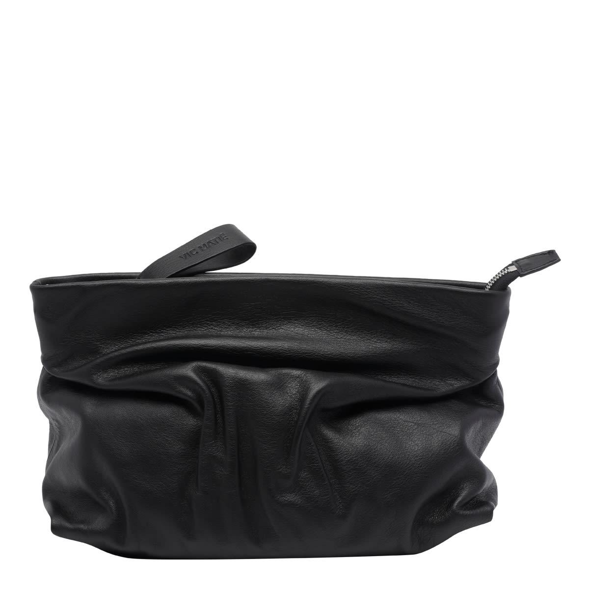 vic matié travel shoulder bag