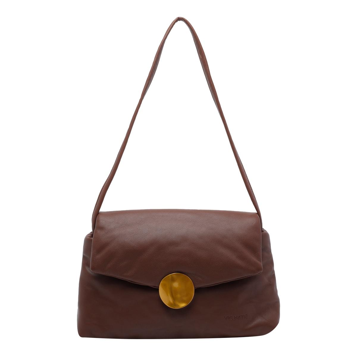 vic matié travel shoulder bag